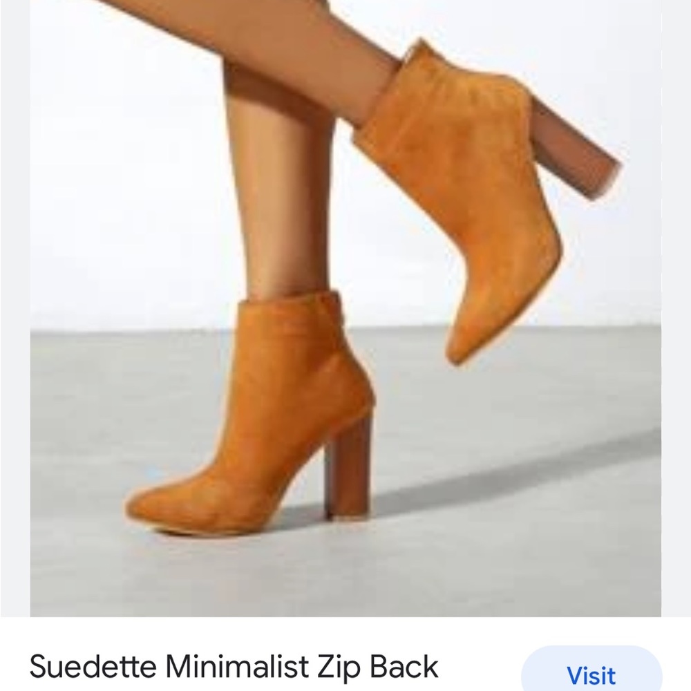 Women’s block heeled boots pumpkin colored in excellent new condition 9